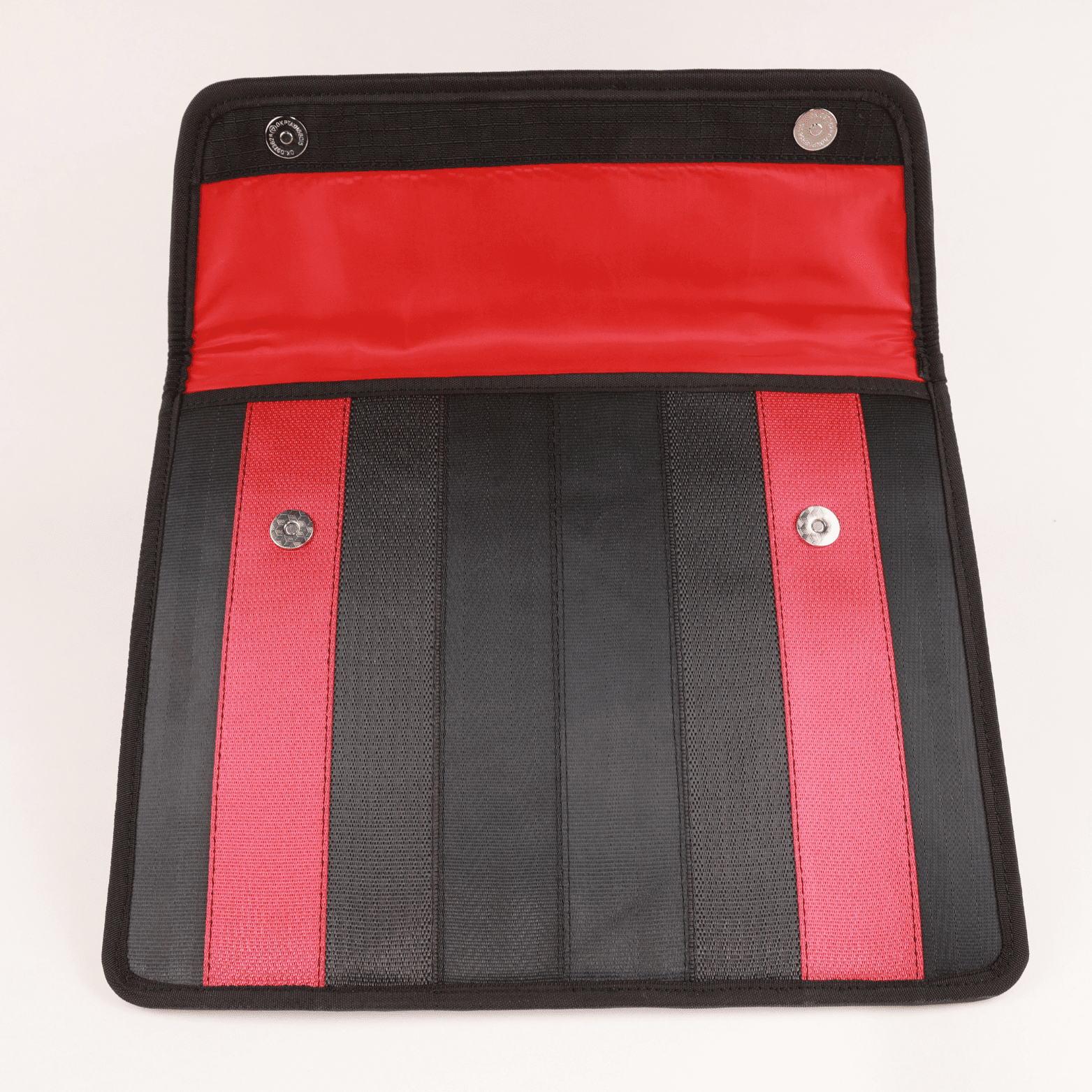 jaggery laptop sleeve inside a corporate gift idea of a laptop sleeve made from upcycled seat belts