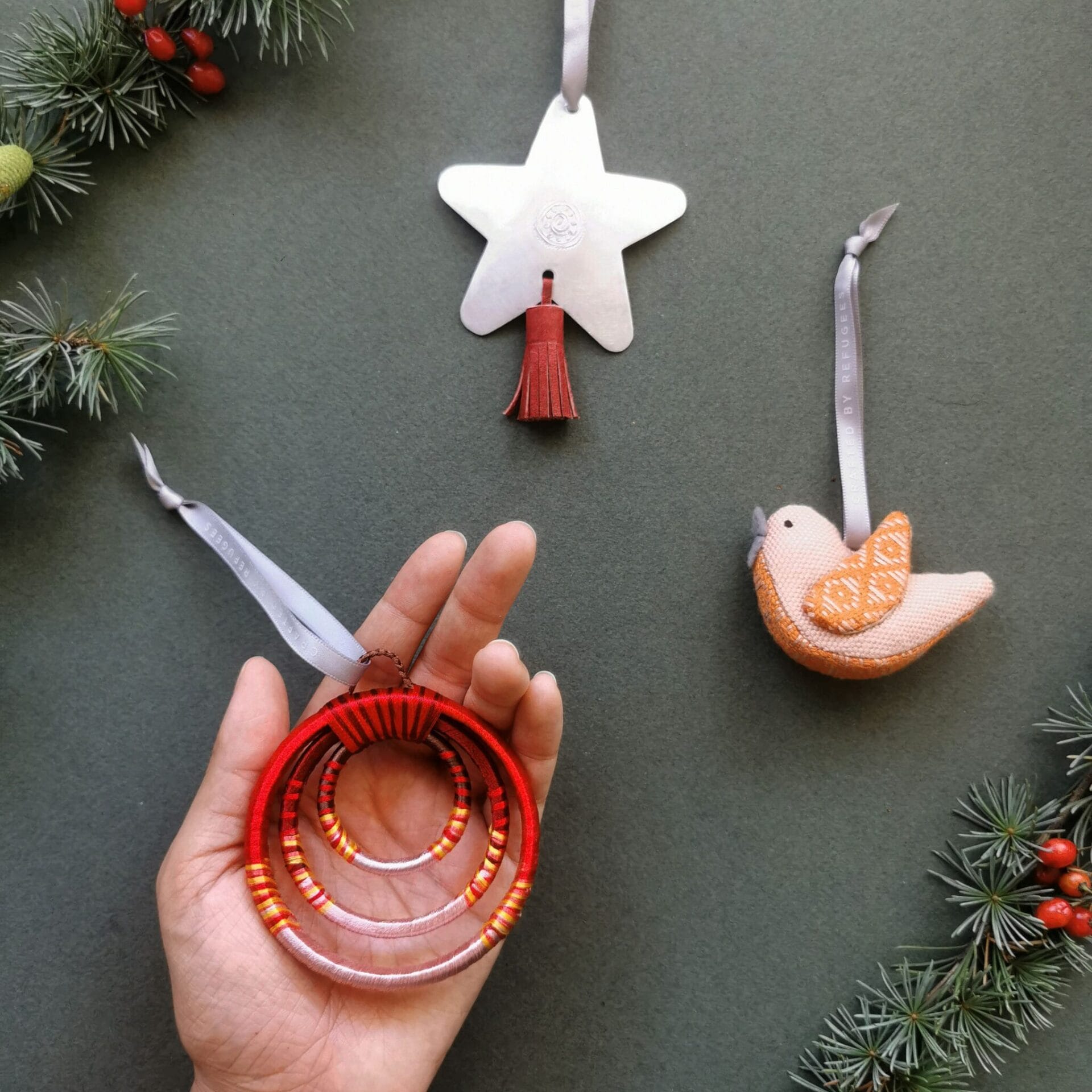 MADE51 beaming rings ornament in hand 3