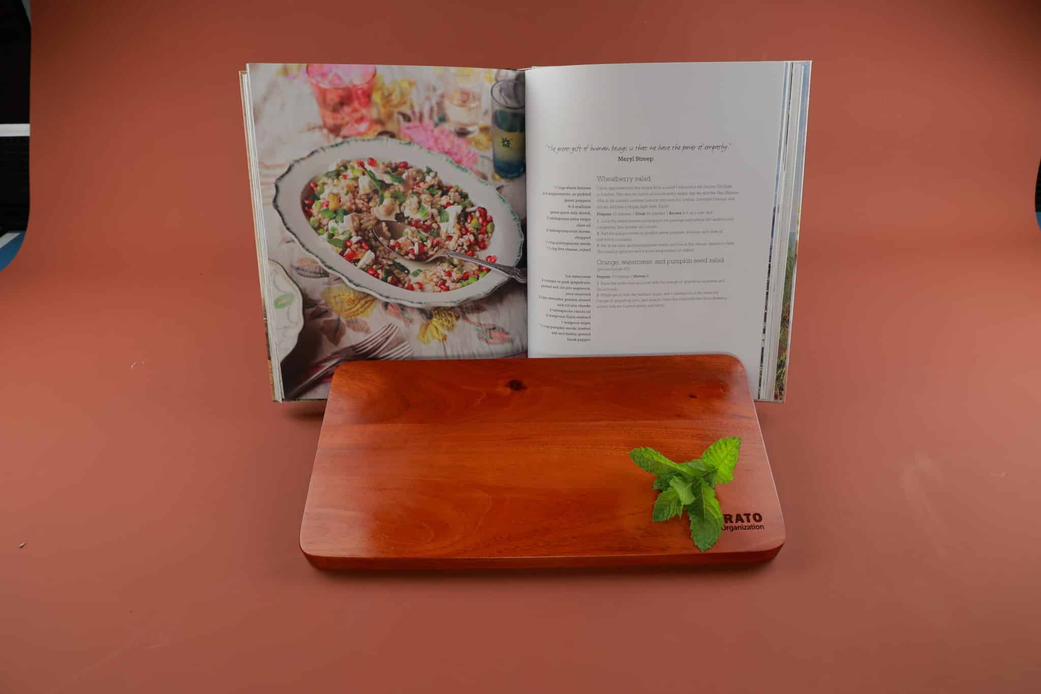 Cooking Up Purpose Gift Box Corporate gifts for the holidays with a charcuterie board and cookbook that make a positive impact
