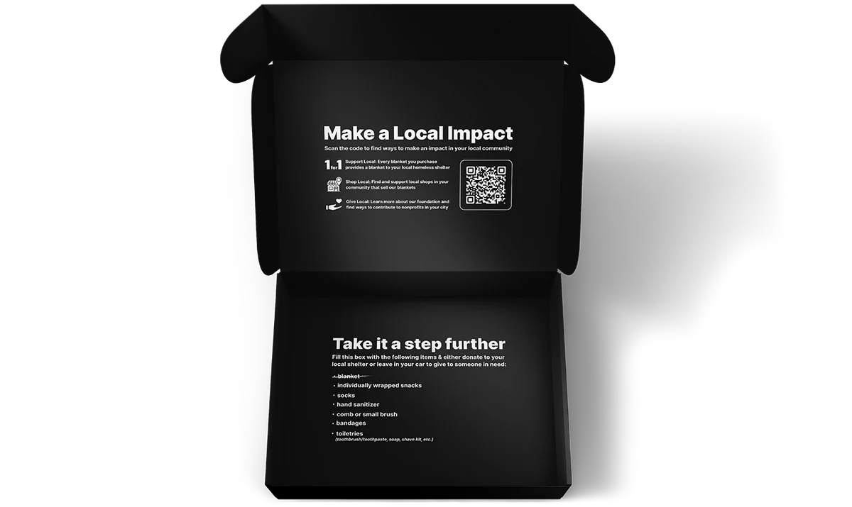 S&A blanket box An opened black packaging tuck box says "make a local impact"
