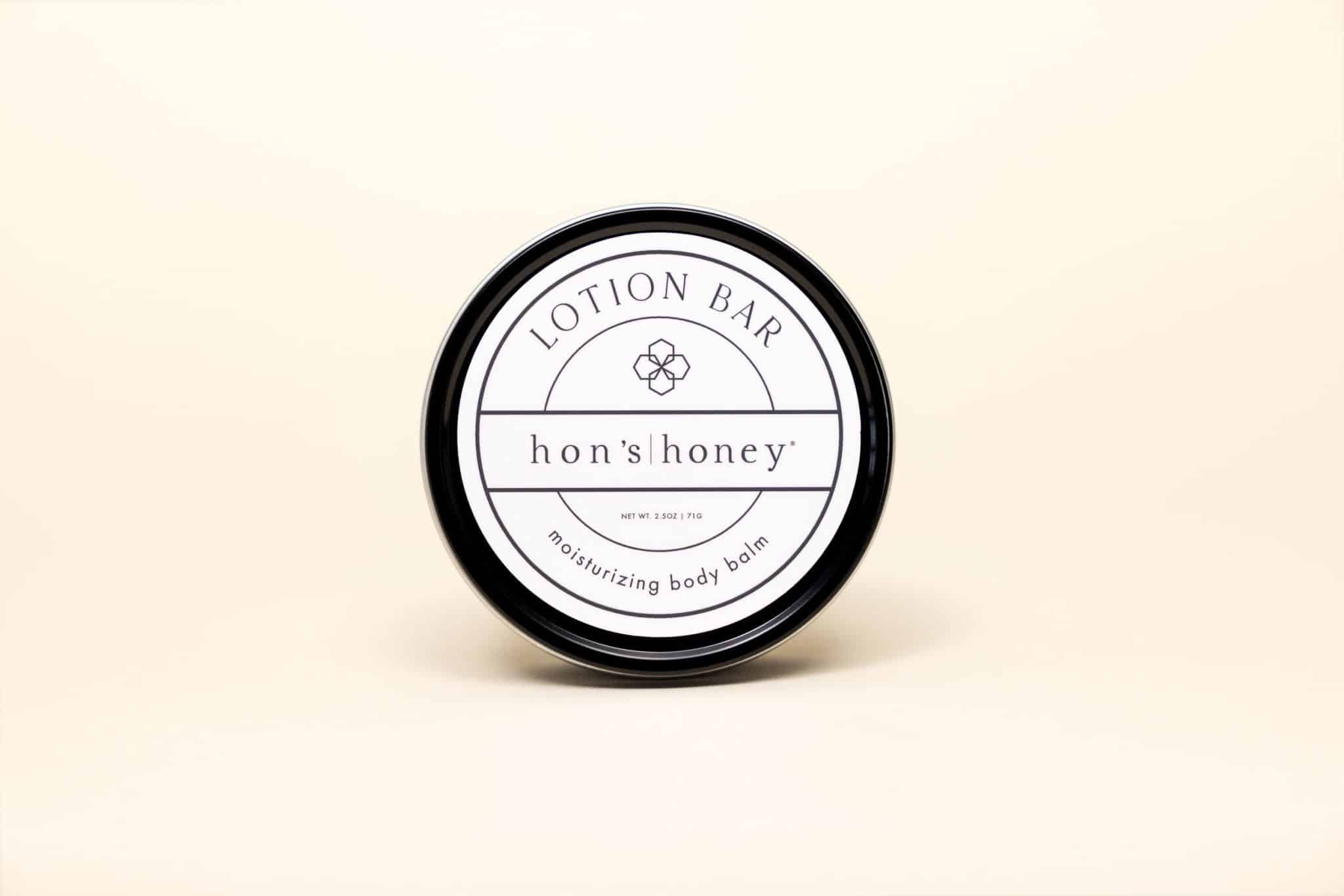 HH lotionbar a lotion bar in a recyclable tin against a cream background - a great wellness gift for employees