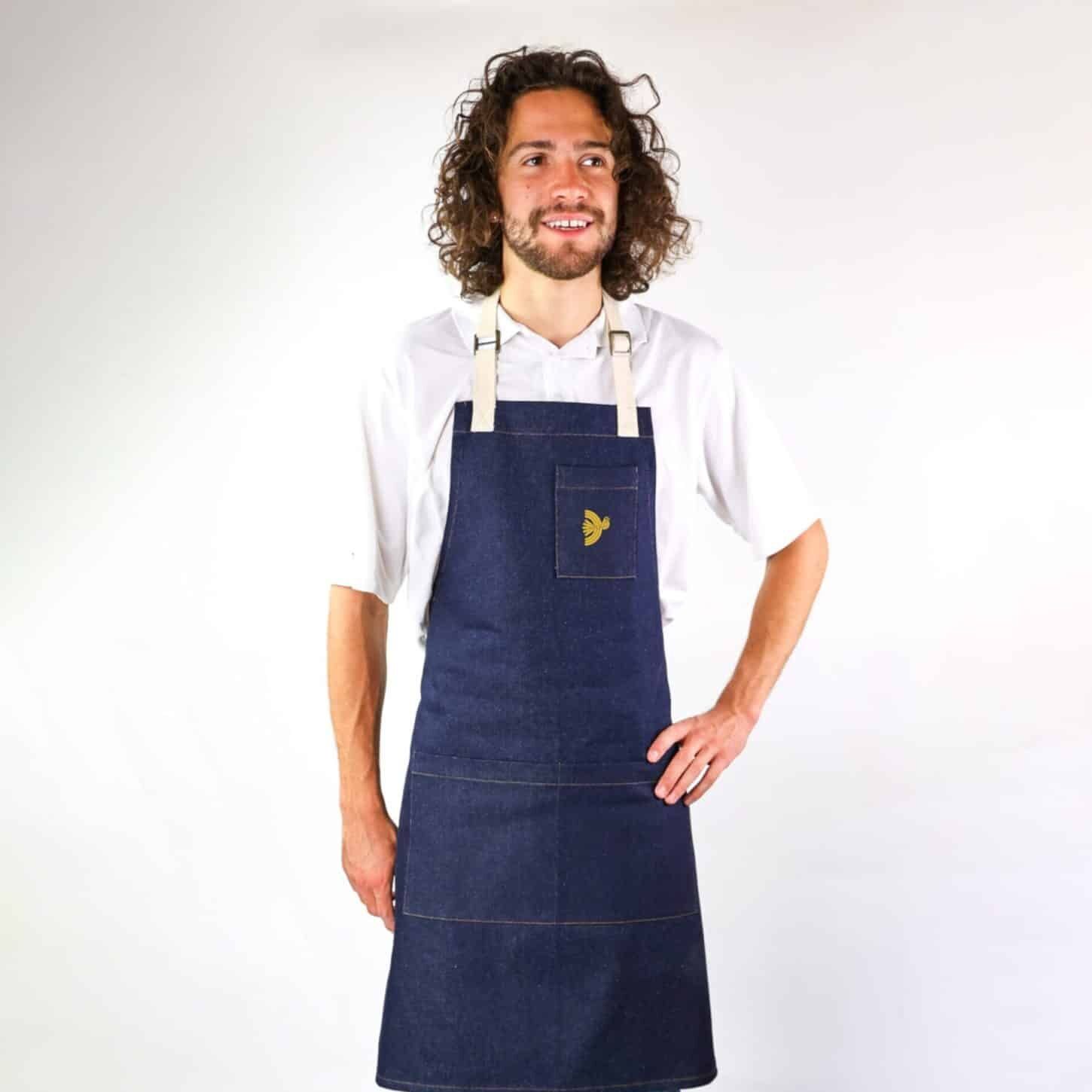 PbP Apron Mockup 01 Denim apron with pockets, supporting safe spaces for women in India.