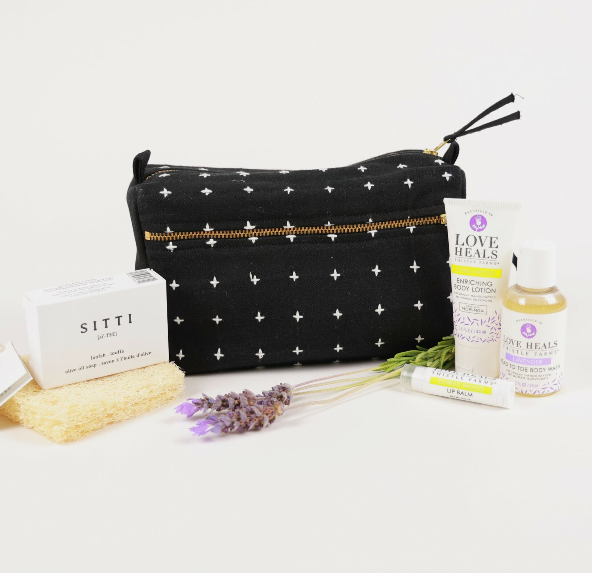 Women's Spa Set Spa Set: bag, olive oil soap, body lotion, body wash, hydrating lip balm, and loofah