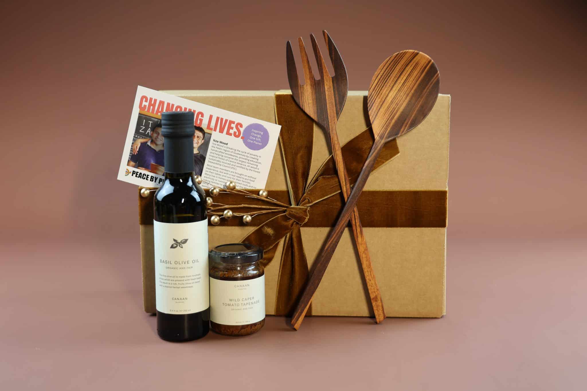 Impact in the Kitchen Gift Box a corporate gift box for the holidays with wooden salad servers, olive oil, and tapenade