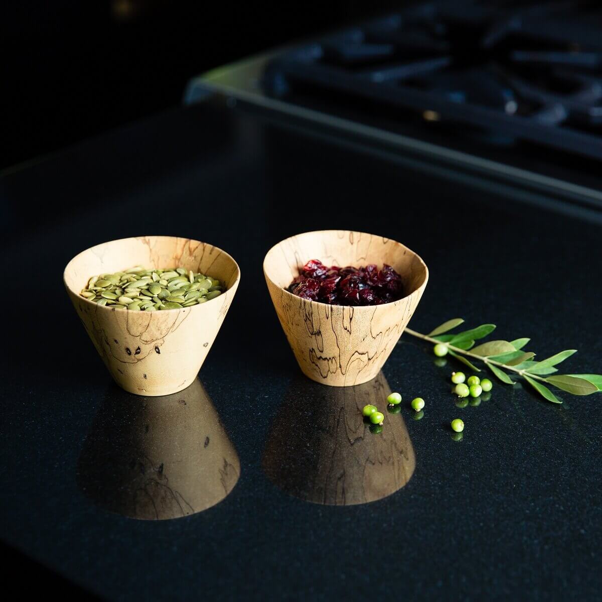 itza wood filled pixi mini bowls Two small handmade Guatemalan wooden bowls filled with seeds