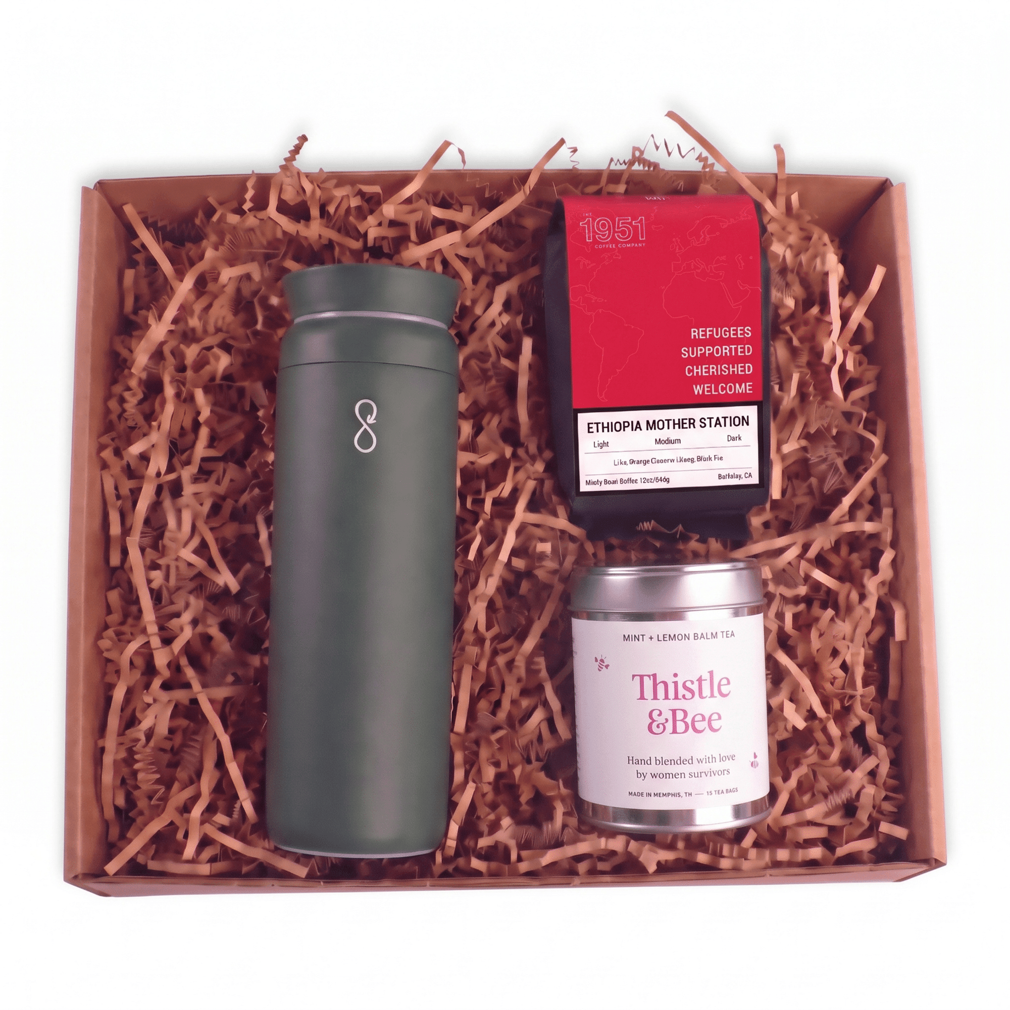 hope on the go green tumbler with bag of coffee and tin tea