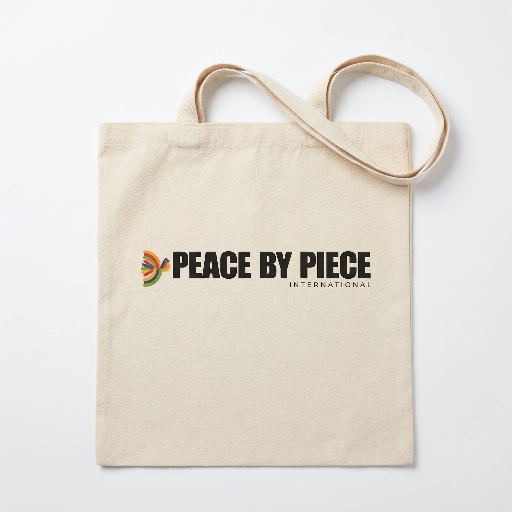 mi eelo tikal tote a simple event tote with a logo that says peace by piece international