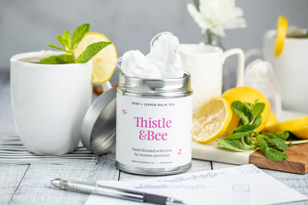 TB tea lemon & mint a tin of tea that supports women survivors makes a great gift for employees