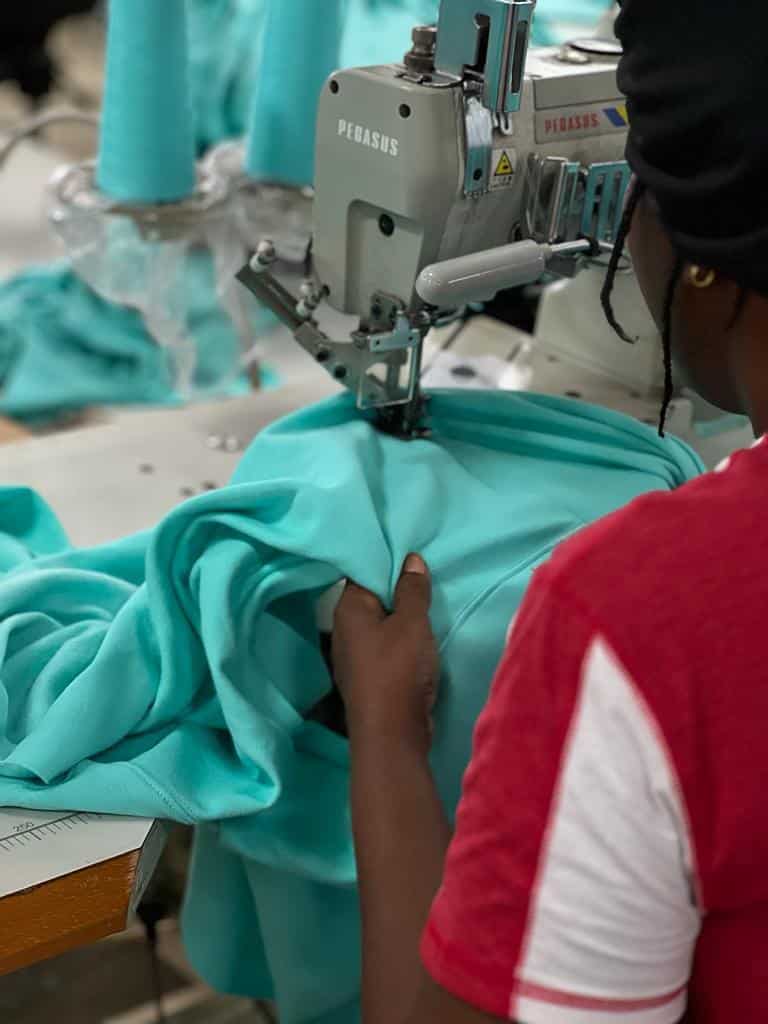 GOEX BTS hands making t-shirts for corporate gifts