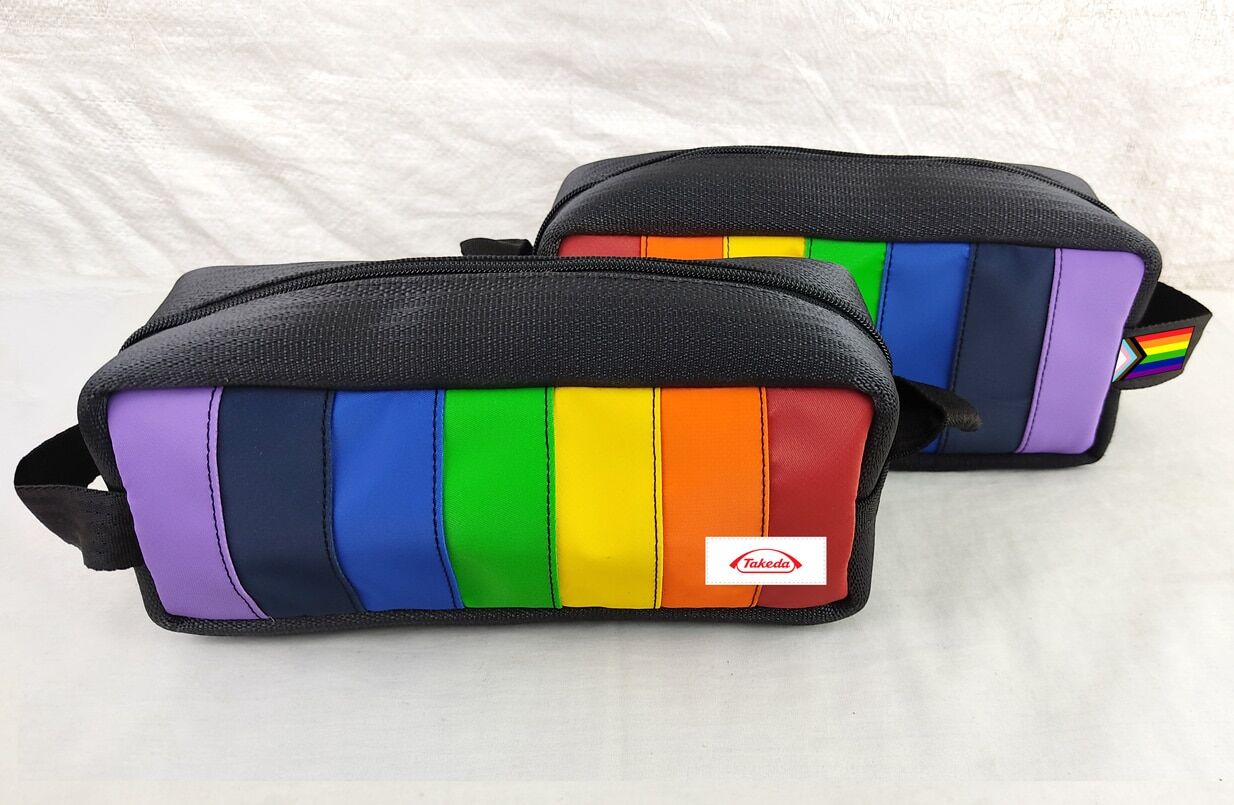 2 jaggery bouncy castle dopp kit 1 a rainbow colored dopp kit made from upcycled bouncy castles